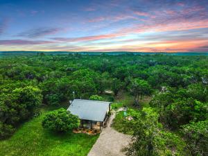 an overhead view of a house in the woods at Canyon Vista in Wimberley