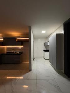 a kitchen with a sink and a counter at Green House in Juazeiro do Norte +9 photos