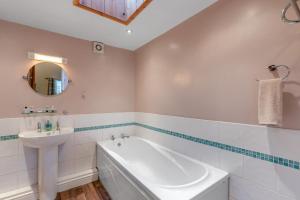 a bathroom with a sink and a bath tub and a sink at 2 Bed in Eggleston oc-l30452 in Middleton in Teesdale +18 photos