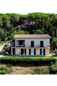an aerial view of a house on a hill at Blue Living - Alta Marina in Marciana Marina