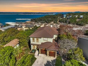an aerial view of a house with the ocean at Riviera Lake House in Canyon Lake