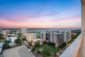 a view of a city from the balcony of a building at Reef-side Splendour City Vistas - Pool - Workspace in Darwin