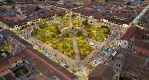 an aerial view of a city with a crowd of people at TuKasa Boutique Liberdad - Buen cafe en Terraza Interior in Ayacucho