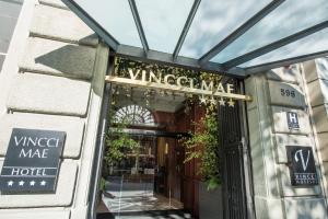 a sign for the entrance to a hotel at Vincci Mae in Barcelona +62 photos