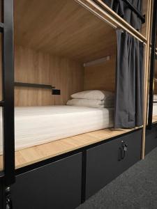 a bunk bed in a tiny house at Kyiv Hostel and Hotel in Kyiv