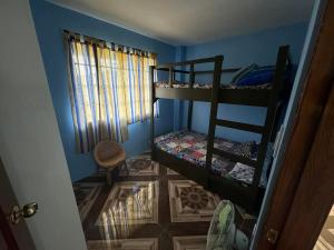 a room with two bunk beds in a room at Rjoyz transient house in Itogon +5 photos