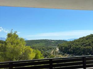 a view of a valley from a balcony at Villa Coral in Novo Selo