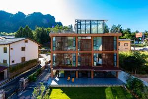 an aerial view of a house with glass at Bor Manju Vacation guesthouse--Near the Ticket Gate--service in Chinese and English in Zhangjiajie