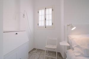 Postel nebo postele na pokoji v ubytování GuestMar