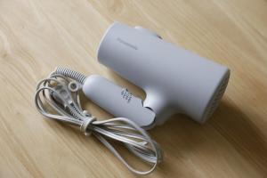 a hair dryer and a hair brush and a hair dryer at CLIP INN by RITO 坂の上の一棟貸し in Tsushima