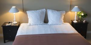 Postel nebo postele na pokoji v ubytování Hotel Hippocampus