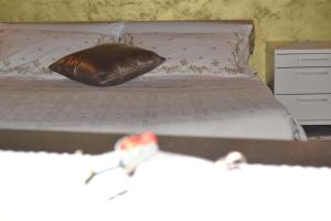 Postel nebo postele na pokoji v ubytování Country House La Fattoria Bellandi