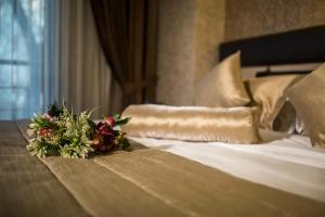Postel nebo postele na pokoji v ubytování Payidar Hotel