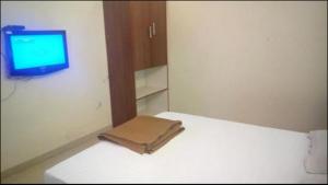 Postel nebo postele na pokoji v ubytování Hotel Rajdeep