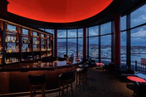 a bar with a view of a city at Hotel Nord Otaru in Otaru