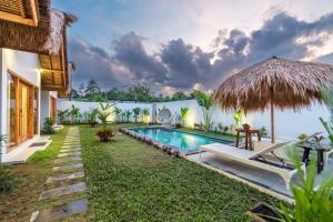 an image of a villa with a swimming pool at LYS Home in Jimbaran