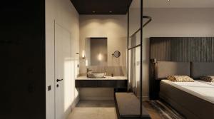 a bathroom with a sink and a mirror at Santa's Hotel Noelle in Rovaniemi