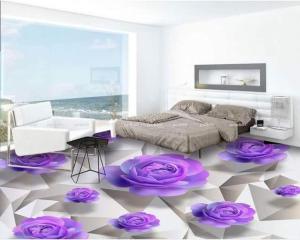 a bedroom with purple flowers on the floor at ROYALrest HOTELS in Elele