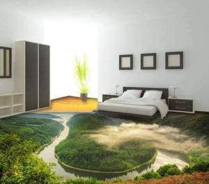a bedroom with a bed and a river in the floor at ROYALrest HOTELS in Elele