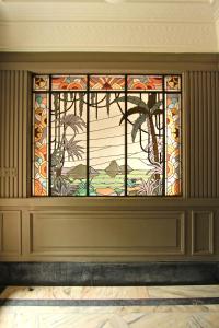 a stained glass window in a room at -Casa Haydée- in Paysandú +42 photos