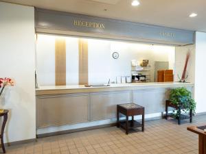 a reception area of a restaurant with a counter at 恩納マリンビューパレス in Onna