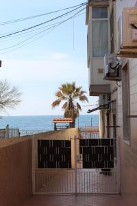 a view of the ocean from a building at Casa DieciMare in Torre del Greco