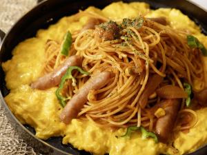 a bowl of food with noodles and vegetables at KOKO HOTEL Nagoya Marunouchi in Nagoya