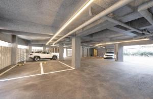 a parking garage with a car parked in it at 그루브 호텔 Groove Hotel in Jeonju