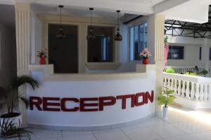 a rendering of the reception of a house at Malaika Gardens resort in Diani Beach