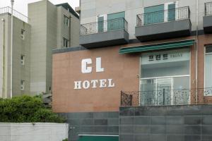 a hotel sign on the side of a building at CL Hotel in Boryeong