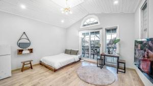 a bedroom with a bed and a large window at Gyeongju Areum Maru in Gyeongju
