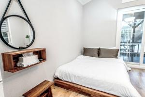 a bedroom with a bed and a mirror at Gyeongju Areum Maru in Gyeongju +31 photos