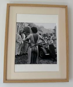 a black and white photo of a woman standing next to a car at Old Antibes 1 Bedroom 4 Persons in Antibes