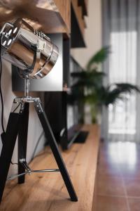 a microphone on a stand in a room at The Hidden Cellar by Heavens Hall in Alexandroupoli