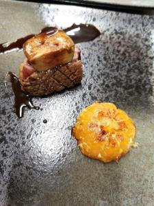 two pieces of food on a table with chocolate at ル カフェ プランタニエ in Yokote