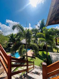 a view from the balcony of a resort with palm trees at Sequor Palm Villa in Siquijor