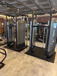 a row ofcold gym machines in a gym at Alex Beach Apartment 34 in Larnaca