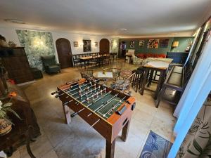 an overhead view of a room with a foosball table at Traumhaus im Wald in Tutzing