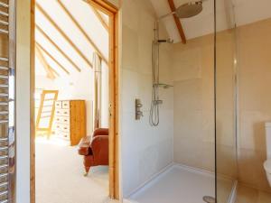 a bathroom with a shower and a sink at 3 Bed in Crackington Haven oc-78271 in Saint Gennys +16 photos