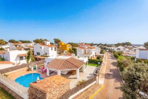 an aerial view of a villa with a swimming pool at Villa Rincon by Villa Plus in Cala Blanca