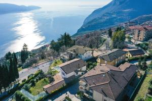 an aerial view of a town next to the water at La Portella - Gardagate in Tignale