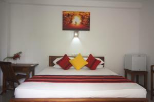 Katil atau katil-katil dalam bilik di Nico Beach Hotel