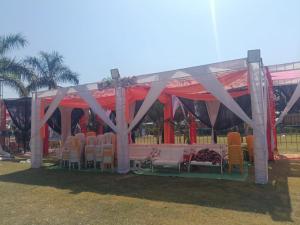 a set up for an event in a marquee at Mangaldeep Resort and Garden in Bābai