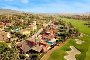an aerial view of a resort with a golf course at El Palacete de Cuevas in Cuevas del Almanzora