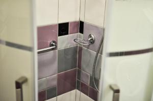 Koupelna v ubytování Páva Apartmanház