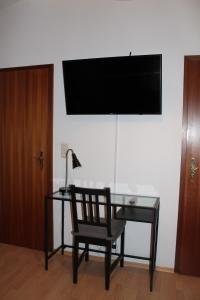 TV a/nebo společenská místnost v ubytování Fair Trade Apartment