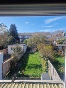 a view from a window of a yard at Oakfield Gardens NY in Edmonton