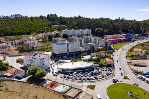 an aerial view of a city with a highway at Park Hotel Porto Valongo in Valongo