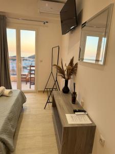 a living room with a couch and a table at Escape Rooms in Himare