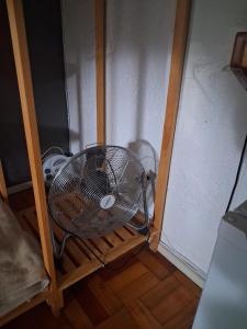 a fan sitting on a shelf in a room at Die Eend Studio in Centurion +9 photos